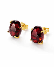 Ember Garnet Stud Earrings by ZodiGlow, garnet gold white earrings, angle view