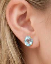 Celeste Blue Topaz Stud Earrings by ZodiGlow, topaz blue gold earrings, detail view