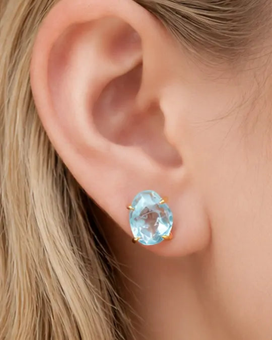 Celeste Blue Topaz Stud Earrings by ZodiGlow, topaz blue gold earrings, detail view