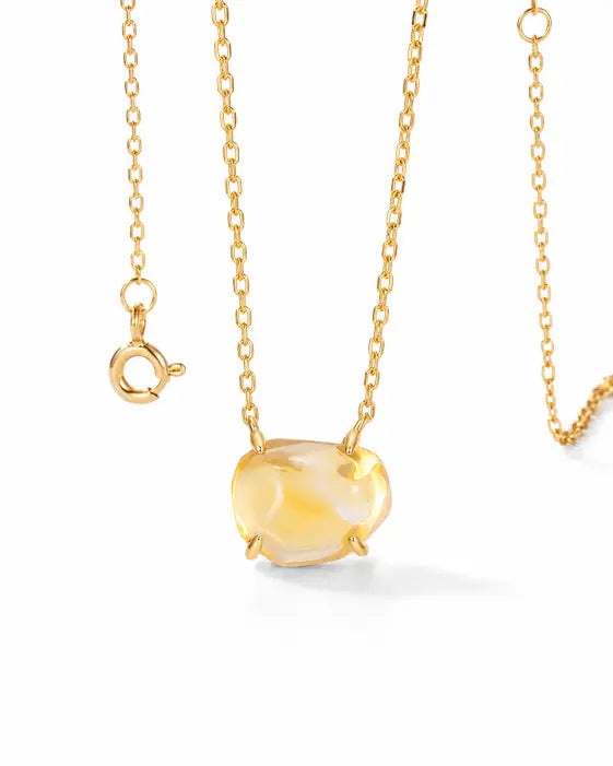 Solara Citrine Necklace by ZodiGlow, citrine gold black necklace, angle view