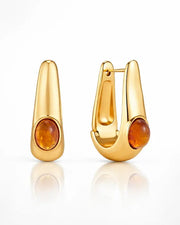 Front view of Amber Glow Drop Earrings by Zodiglow