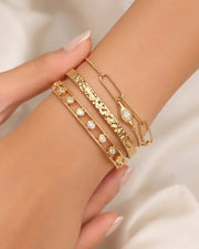 Close-up view of Amora Heart Gold Cuff Bracelet by Zodiglow
