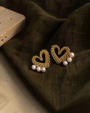 Detail view of Amorette Freshwater Pearl Heart Stud Earrings by Zodiglow