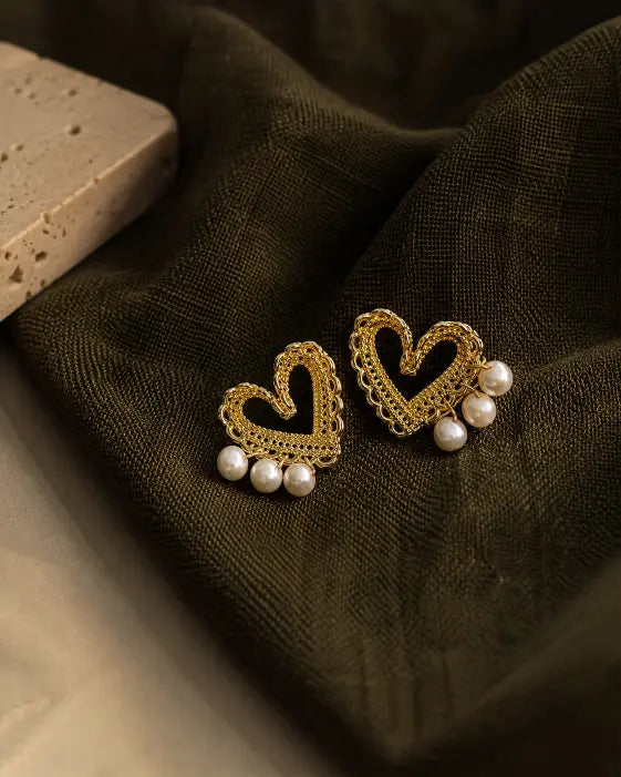 Detail view of Amorette Freshwater Pearl Heart Stud Earrings by Zodiglow