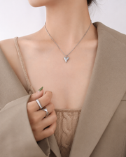 Side view of Amorette Sculpted Heart Pendant Necklace by Zodiglow