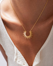 Detail view of Astra Crescent Sun Necklace by Zodiglow