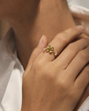 Detail view of August Birthstone Peridot Blossom Ring by Zodiglow