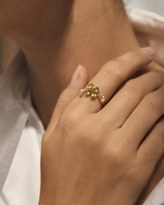 Detail view of August Birthstone Peridot Blossom Ring by Zodiglow