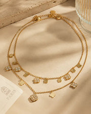 Close-up view of Aurelia Clover Charm Necklace & Bracelet Collection by Zodiglow
