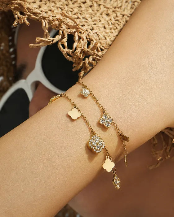 Detail view of Aurelia Clover Charm Necklace & Bracelet Collection by Zodiglow