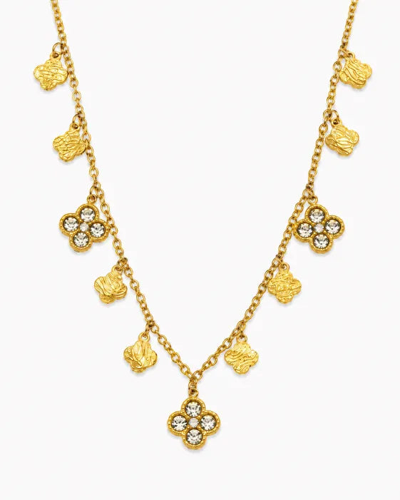Styled view of Aurelia Clover Charm Necklace & Bracelet Collection by Zodiglow