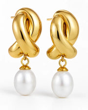 Front view of Aurelia Knot Pearl Drop Earrings by Zodiglow