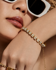 Detail view of Aurelia Leaf Zircon Bracelet & Earrings by Zodiglow