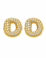 Close-up view of Aurelia Pavé Initial Stud Earrings by Zodiglow