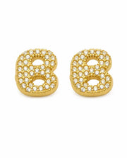 Detail view of Aurelia Pavé Initial Stud Earrings by Zodiglow