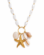 Front view of Aurelia Shell Starfish Charm Necklace by Zodiglow