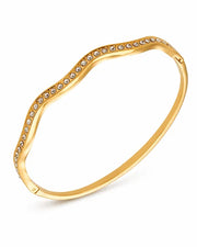 Styled view of Aureline Sculpted Zircon Bangle Collection by Zodiglow