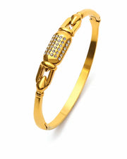 Close-up view of Aureline Sculptural Stacking Bangle Collection by Zodiglow