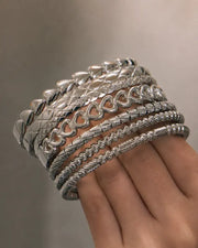 Side view of Aureline Stackable Bangle Collection by Zodiglow