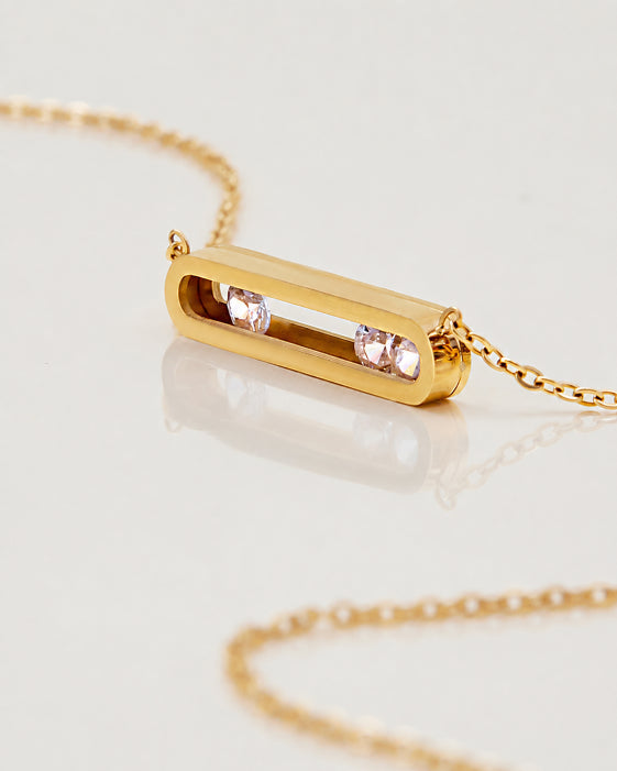 Detail view of Aveline Gold Crystal Bar Necklace by Zodiglow