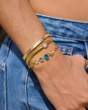 Detail view of Azure Tide Fish Tail Bracelet by Zodiglow