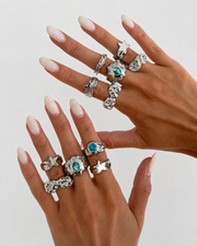 Side view of Blue Tide 11-Piece Ring Set by Zodiglow