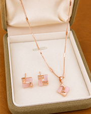 Detail view of Blush Cat-Eye Jewelry Set by Zodiglow