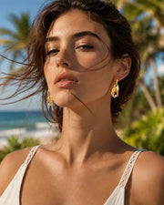 Alternate view of Caspia Gold Claw Huggie Earrings by Zodiglow