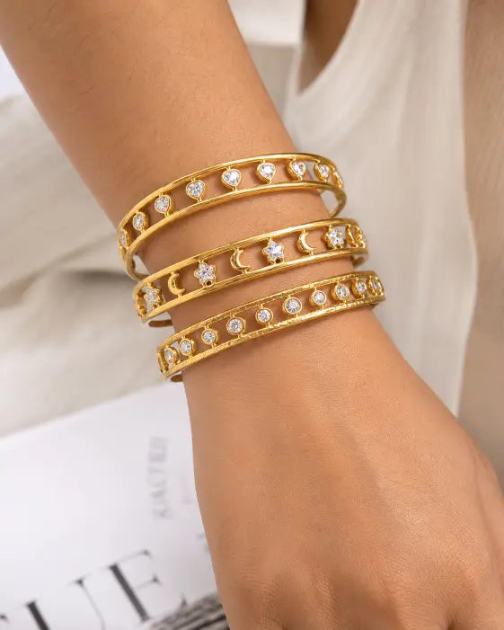 Side view of Celeste Orbit Gold Cuff Bracelet by Zodiglow