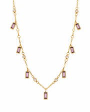 Side view of Celestia Baguette Crystal Charm Necklace by Zodiglow