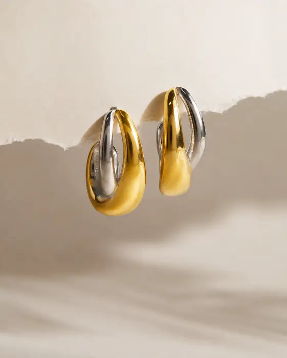 Detail view of Celestia Duo Twist Hoops by Zodiglow