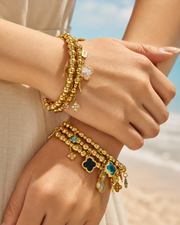 Styled view of Clover Charm Beaded Bracelet by Zodiglow