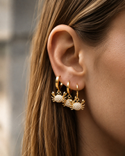 Detail view of Coralie Zircon Crab Huggie Earrings by Zodiglow