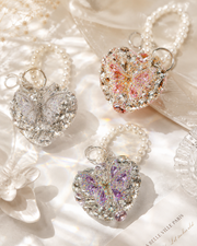 Side view of Crystal Butterfly Heart Mirror by Zodiglow