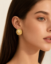 Close-up view of Éclat Pearl Accent Earrings by Zodiglow