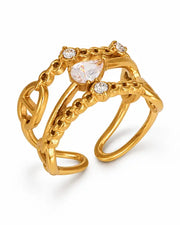 Close-up view of Élan Crystal & Pearl Sculptural Ring Collection by Zodiglow