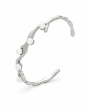 Close-up view of Élan Sculptural Bangle Collection by Zodiglow