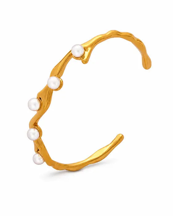 Front view of Élan Sculptural Bangle Collection by Zodiglow