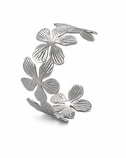 Styled view of Élan Sculptural Bangle Collection by Zodiglow