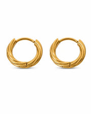 Styled view of Élan Twisted Hoop Earrings by Zodiglow
