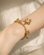 Close-up view of Elara Garden Charm Necklace & Bracelet by Zodiglow