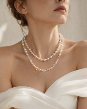 Styled view of Lumière Faux Pearl & Clear Bead Necklace by Zodiglow