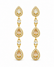 Styled view of Elara Triple Teardrop Zircon Earrings by Zodiglow