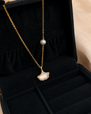 Detail view of Élodie Freshwater Pearl Ginkgo Necklace by Zodiglow