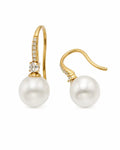 Front view of Élodie Pearl Arc Zircon Drop Earrings by Zodiglow