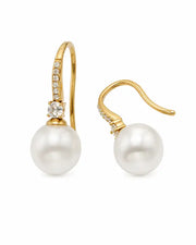 Front view of Élodie Pearl Arc Zircon Drop Earrings by Zodiglow