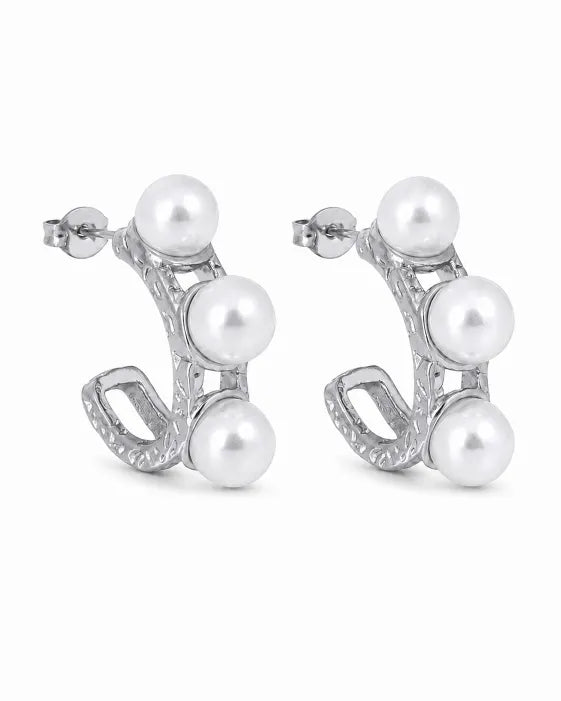 Side view of Élodie Pearl Sculptural Hoop Earrings by Zodiglow