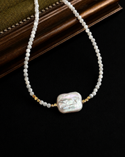 Detail view of Éloise Baroque Freshwater Pearl Beaded Necklace by Zodiglow
