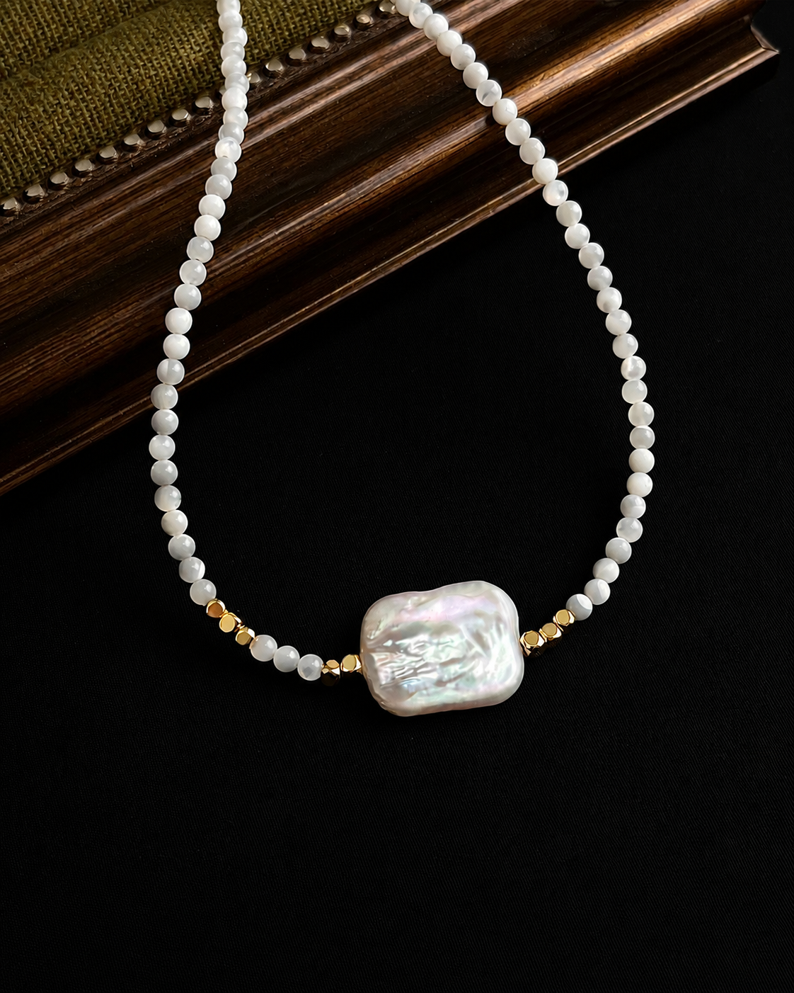 Detail view of Éloise Baroque Freshwater Pearl Beaded Necklace by Zodiglow