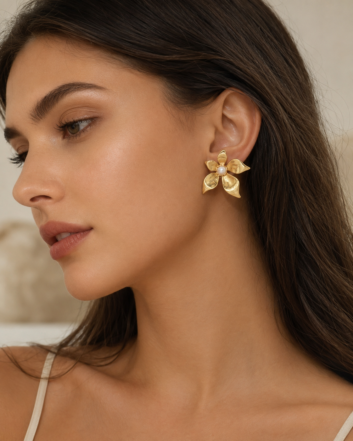 Close-up view of Fleur Sculptural Stud Earrings by Zodiglow